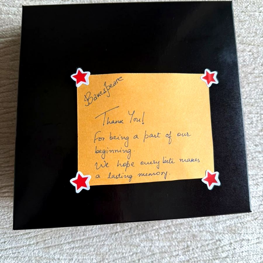 A Bakespeare box with a handwritten thank you note